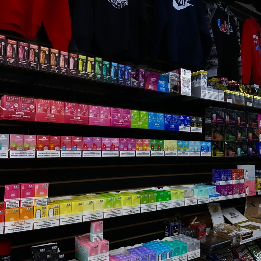 A colorful array of high-quality disposable vape devices from IGET, HQD, and other brands.